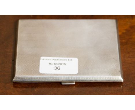 An engine turned silver cigarette case, Birmingham 1927 hallmarked