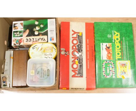 A box of family board games, typewriter, dominoes, etc 
