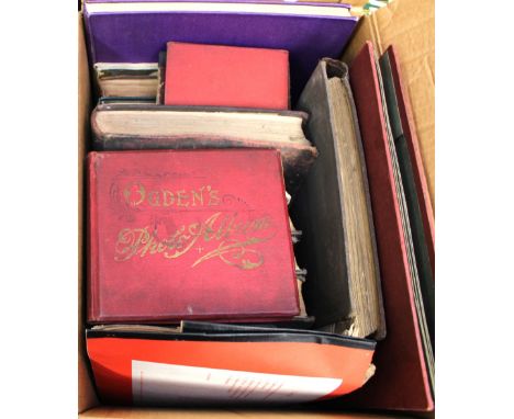 A quantity of books including Household Physical, cigarette cards in album, Commemorative tools, etc 