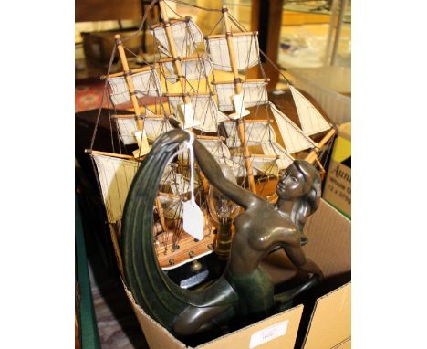 An Art Deco style lamp base, together with a mantle clock and a model of the 'Mayflower' (3) 