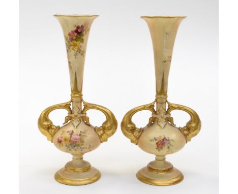 A pair of Royal Worcester narrow necked twin handled, gilded bulbous pedestal vases (one af) 