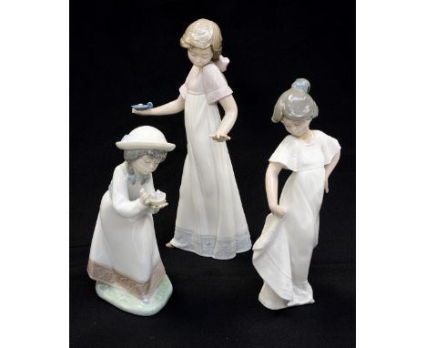 Three NAO ceramic figurines 