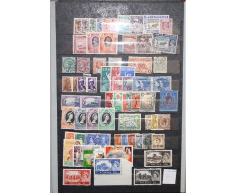  Collectors Commonwealth duplicates in large red stockbook (M&U) better values noted, including twenty early NZ with adverts 