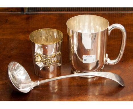 An Elkington plate tankard, a William Hutton plated ladle and a white metal Continental beaker 