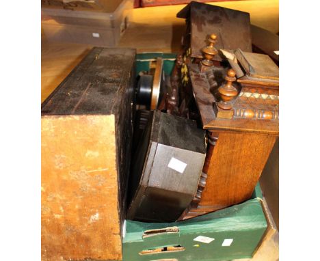 A box of clocks to include a cuckoo clock, mantle clocks, wall clock, etc.