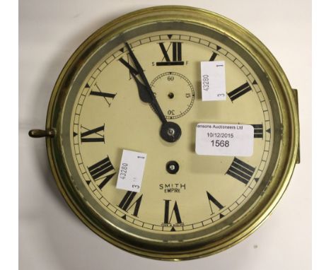 A brass Smiths wall clock, having Roman numerals 