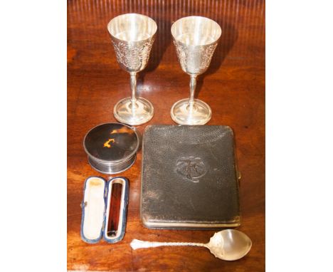 A pair of chased silver goblets, Birmingham 1974, 158.4 grams approx, a silver and tortoiseshell trinket box, Birmingham 1923