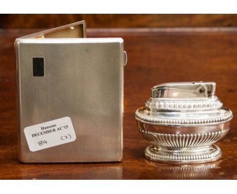 A Birmingham 1946 silver cigarette case, engine turned and gilt lined, 4.45 troy oz, approximately, together with a Ronson si