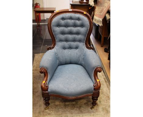 A mid Victorian mahogany button backed blue salon arm chair, with a elm seated captain's chair. (2)