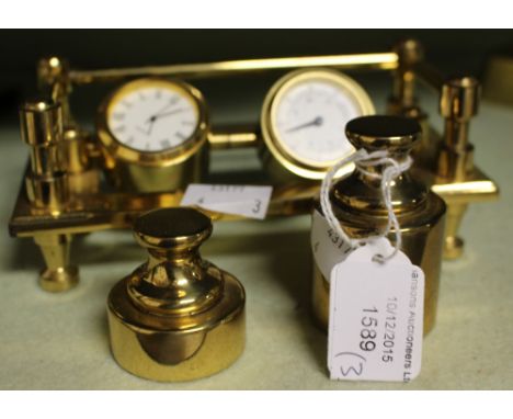 Two brass weights and a brass desk clock / thermometer (3)