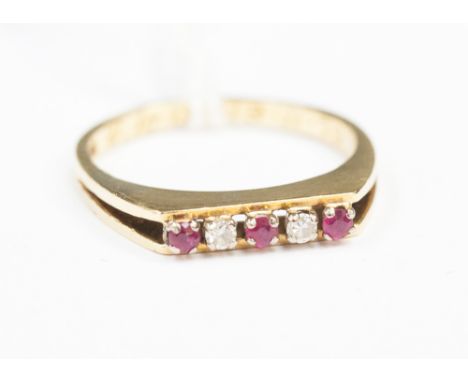 An 18ct ruby and diamond ring, channel set alternate three rubies and two brilliant cut diamonds 