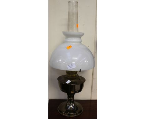An oil lamp and shade/funnel, brass plate 