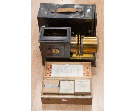 A magic lantern slide projector and box of various slides, Church Army Lantern label, the case marked O.H.M.S., slides includ