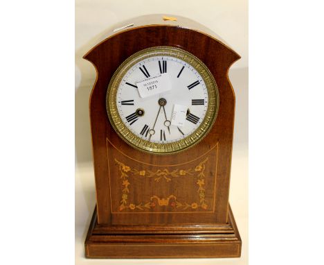 An Edwardian inlaid mantle clock in mahogany 