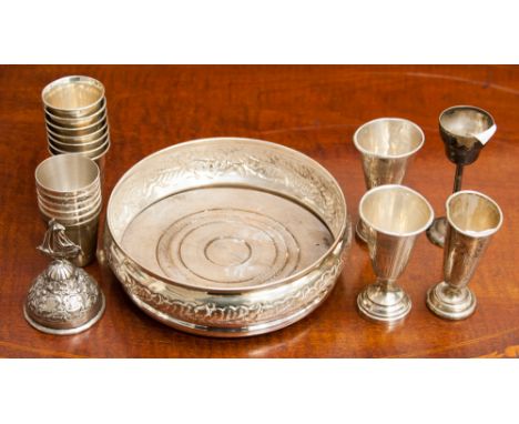 A set of seven circa 1900, Russian 0.84 standard silver vodka tots, hallmarked to the base of each with maker's mark 'IP' in 