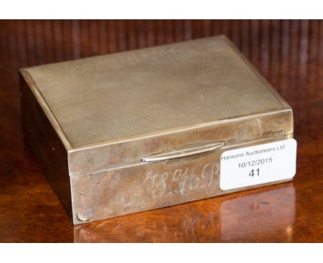 An Elizabeth II sterling silver box of square form with engine turned decoration and wood lined interior, full hallmarks stru