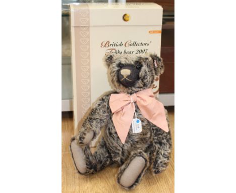 A boxed Steiff 2007 'Old Black Bear' grey tipped, height 40 cm approx, limited edition No. 1160/3000, with certificate 