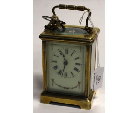 A rather nice French carriage clock with enamel detailing on dial, R and C made in Paris with keys 