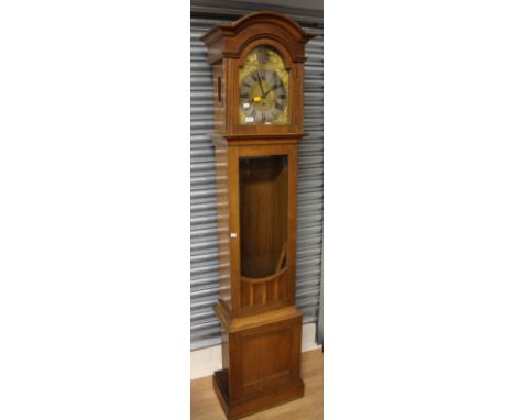 A Tempus Fugit longcase eight day clock, the glazed face door opening to reveal a silvered chapter dial and three winder hole