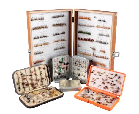 A COLLECTION OF FISHING FLIEScontained in three tins, a wooden box and a plastic case, PROPERTY OF MR K.D. DEBENHAM Fisheries