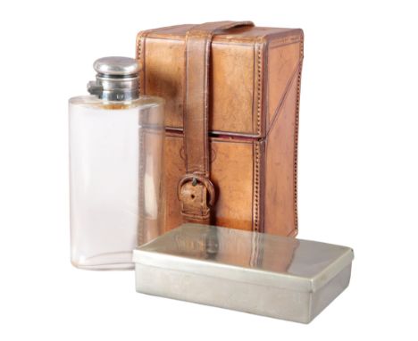 CRANSWICK OF PICCADILLY: A LEATHER HUNTING OR SADDLE CANTEENcontaining sandwich tin and glass spirit flask with silver-plated