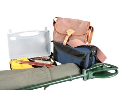 A 12-BORE CLEANING RODa Bisley shooting stick in bag; a canvas and leather cartridge bag by Liddesdale of Scotland and a clay