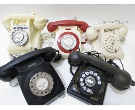 Group of five vintage finger-dial telephones to include an ivory Bakelite coloured 164-57 phone with blue slide drawer, and b