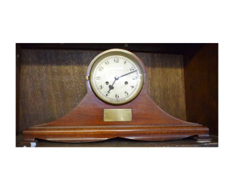 Mahogany cased mantel clock with presentation plaque dated 1923, 21ins wide 