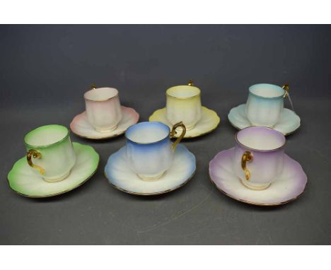 Set of four Royal Albert rainbow tea cups and saucers with gilded handles of varying colours (6) 