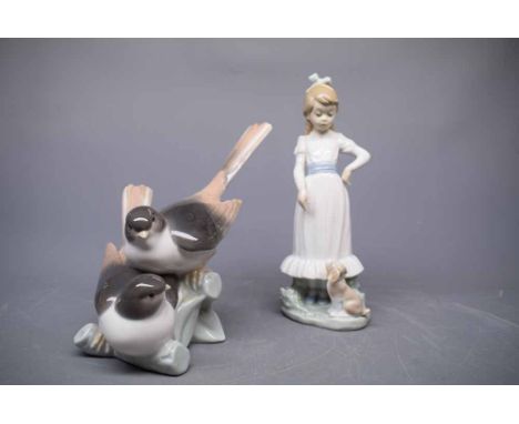 Lladro model of two birds together with a further Nao model of a young girl and puppy (a/f) (2) 