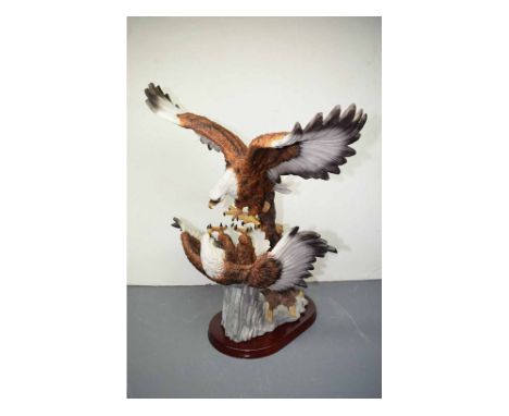 Resin academy model of two eagles, on a rocky plinth, 19ins tall 