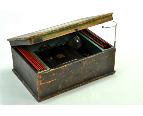 A very old issue Magic Lantern with Box and slides. Well preserved. German. 