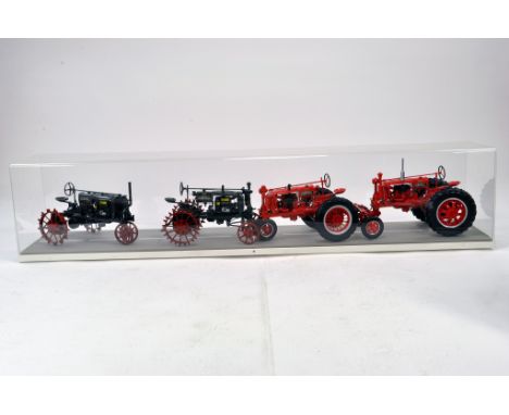 Impressive Ertl Precision 1/16 Farmall / McCormick Vintage Tractor Display. Models contained within large presentation case w