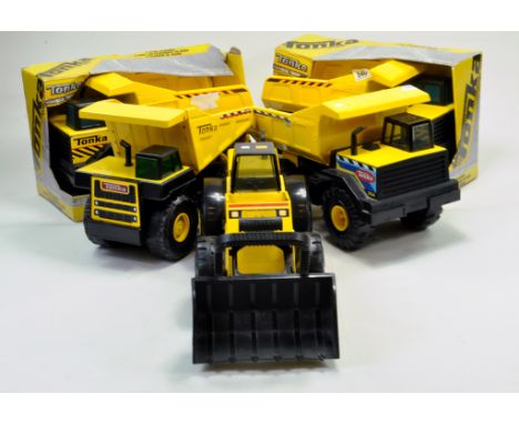 Impressive Large Scale Tonka Toys Construction group comprising various issues inc 4 x Dump Trucks, 2 boxed and a loading sho