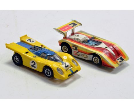Aurora Miniature Slot Car group comprising two issues. Used. Untested. Some light damage.