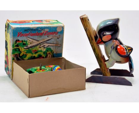 Yonezawa (Japan) Tin Plate Mechanical Vacationland Express Toy plus a VINTAGE ZHUOMUNIAO TIN WOODPECKER. 
