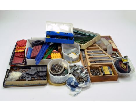 A large quantity of Meccano components, tools, parts and accessories. Various colour combinations in addition to many various