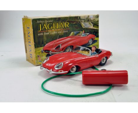 Marx Large Scale Vacuum Plated Battery Operated Jaguar with Headlights and Horn. Nice example is generally excellent in very 