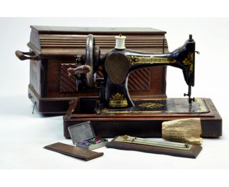 A vintage Singer Sewing machine with Wooden Case (very heavy) in addition to accessory items plus a thermometer. 