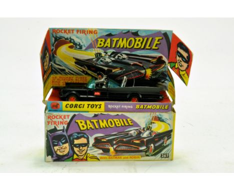 Corgi No. 267 Batmobile with Batman and Robin. Early issue is generally excellent contained in generally good box with plinth