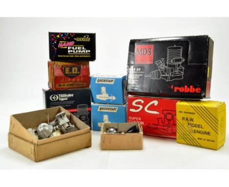 An Impressive group of Model Aircraft Engine Parts including Engines and other accessories. Makers include Thunder Tiger, MDS