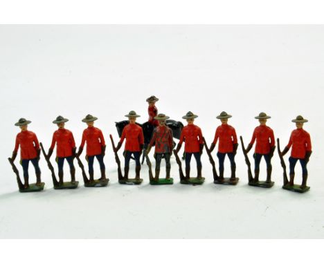 Johillco metal figure group comprising Canadian Mounties on foot plus one other. Generally Good. 