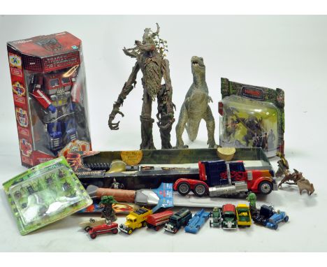 An interesting group of toys including Large Hasbro 20th anniversary Optimus Prime Transformer, plus another and other boxed 