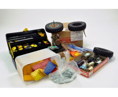 A large quantity of Meccano components, tools, parts and accessories contained in boxes / toolboxes. Various colour combinati