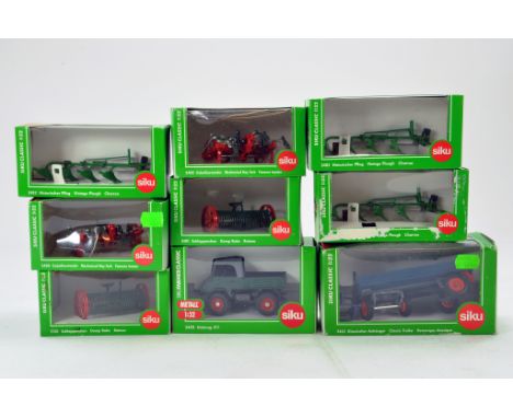 Siku 1/32 Farm Issues comprising Vintage Series Tractor and Implement issues. Generally Excellent to Near Mint in Boxes. 