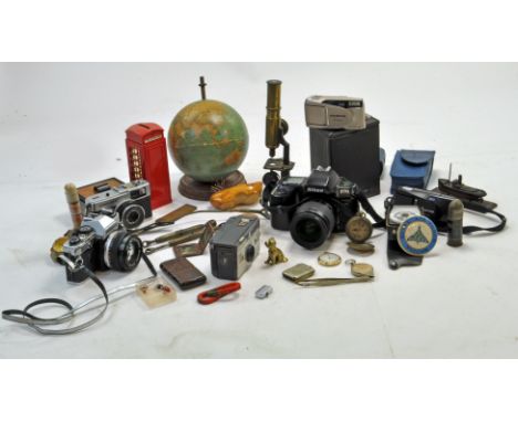 A misc group of items including vintage Camera issues, Watches, Lighters and others.