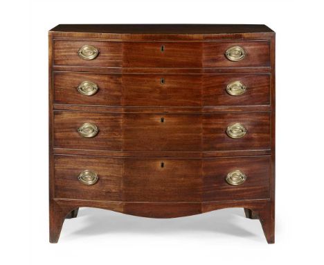 LATE GEORGE III MAHOGANY CHEST OF DRAWERS EARLY 19TH CENTURY of angled bowfront outline, the crossbanded caddy top above four