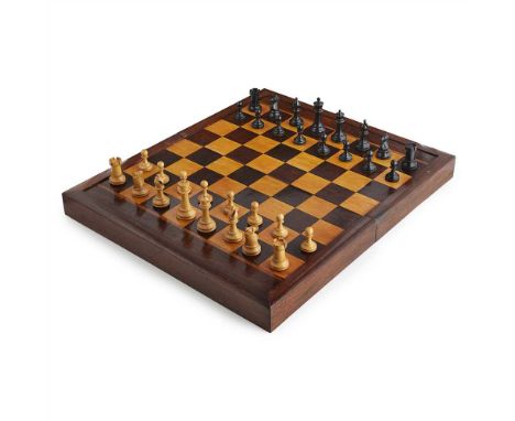 Y STAUNTON STYLE CHESS SET AND GAMEBOARD 19TH CENTURY comprising thirty-two boxwood and ebonised wood chess pieces, in a box;