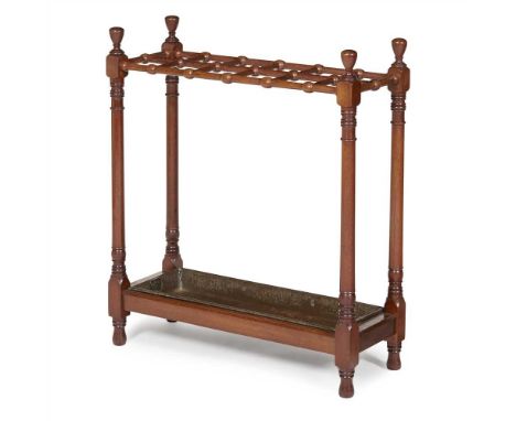 LATE REGENCY MAHOGANY STICK STAND EARLY 19TH CENTURY with twelve divisions and turned knop finials above a metal drip tray (D