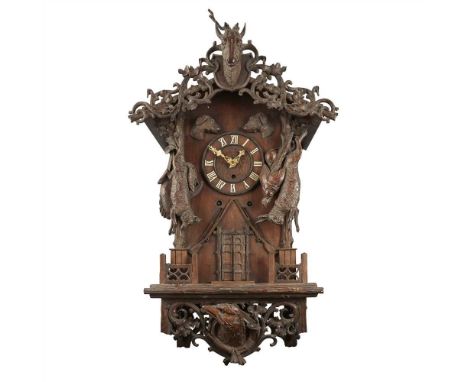 LARGE BLACK FOREST CARVED WALL CLOCK BY EMILIAN WEHRLE, RETAILED BY THE MORATH BROTHERS, LIVERPOOL the gabled cornice with sc